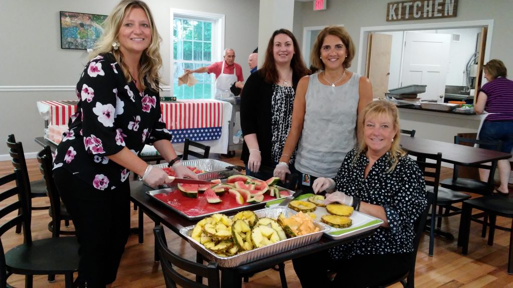 Employees Volunteering At Southington Bread For Life | COCC